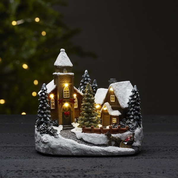 LED Kirche - weihnachtliche Dorfszene mit Drehbaum - 7 warmweiße LED - H: 18cm - Timer - bunt